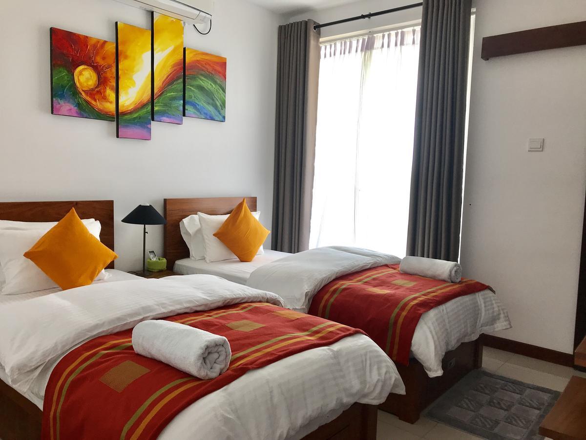 Araliya Oceanfront Condos Nilaveli, Trincomalee Buitenkant foto