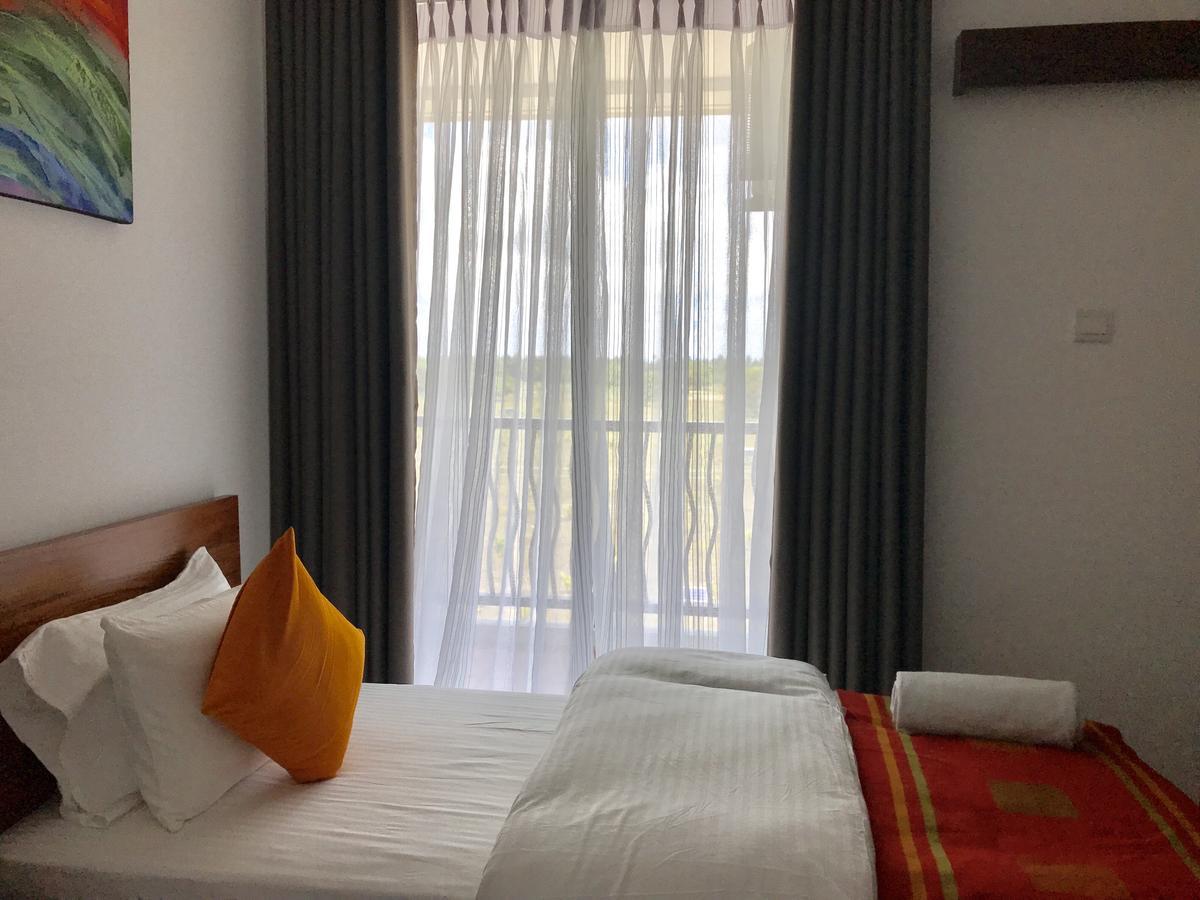 Araliya Oceanfront Condos Nilaveli, Trincomalee Buitenkant foto